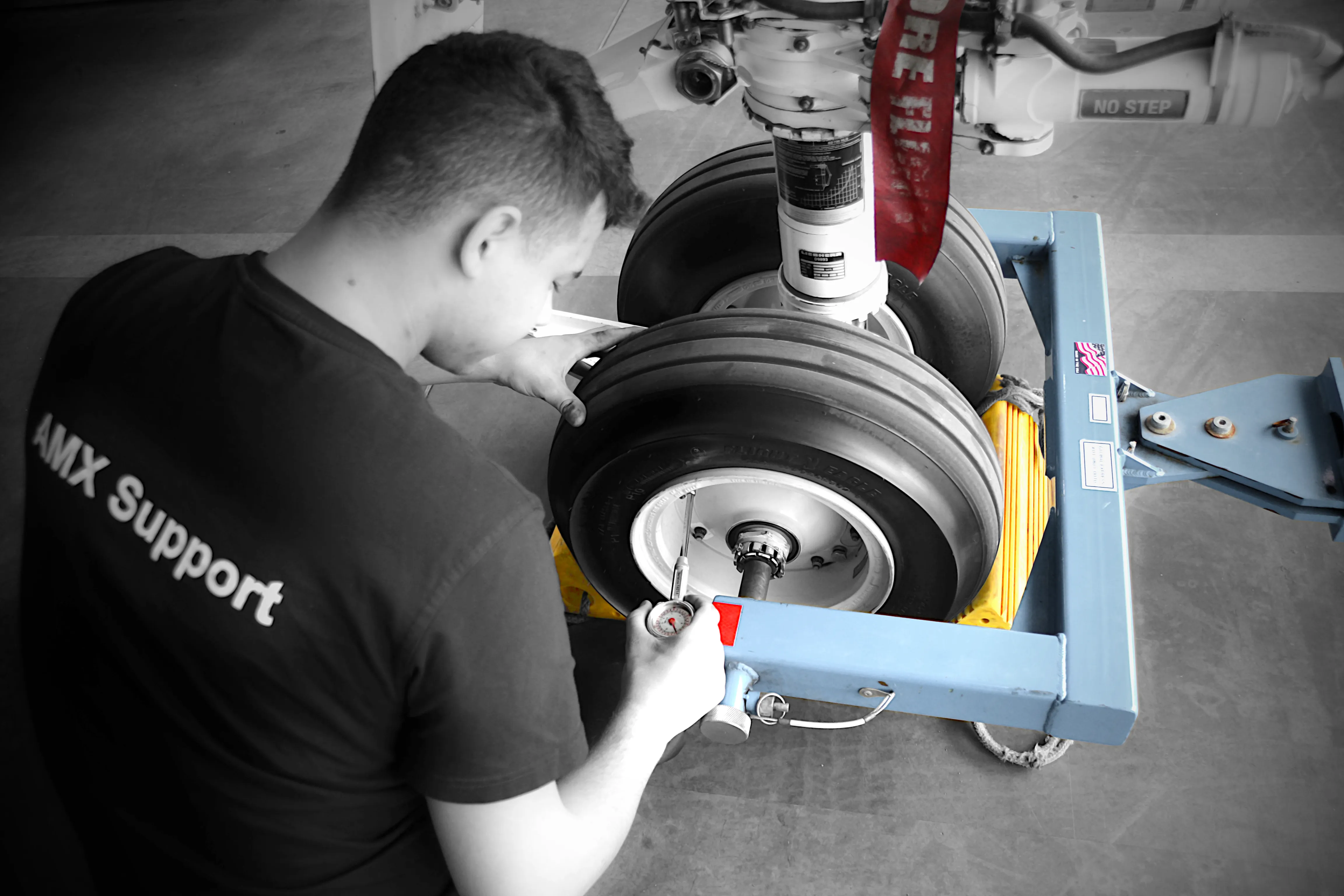 Technician performing aircraft line maintenance